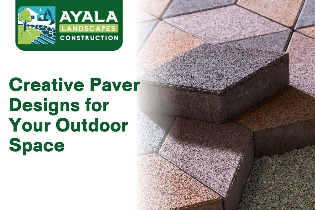 A patio with a modern herringbone paver design.