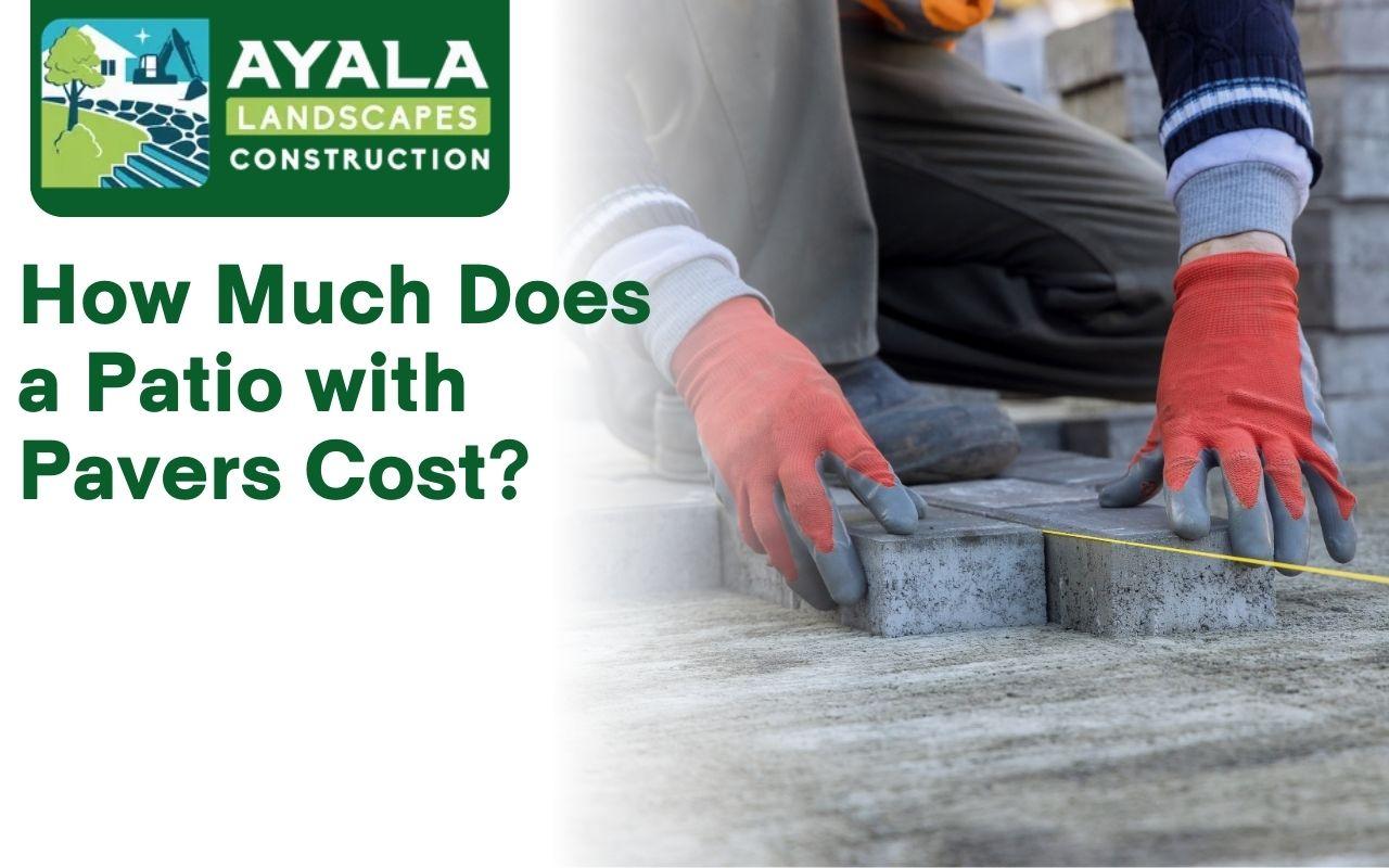 A professional contractor installing a paver patio