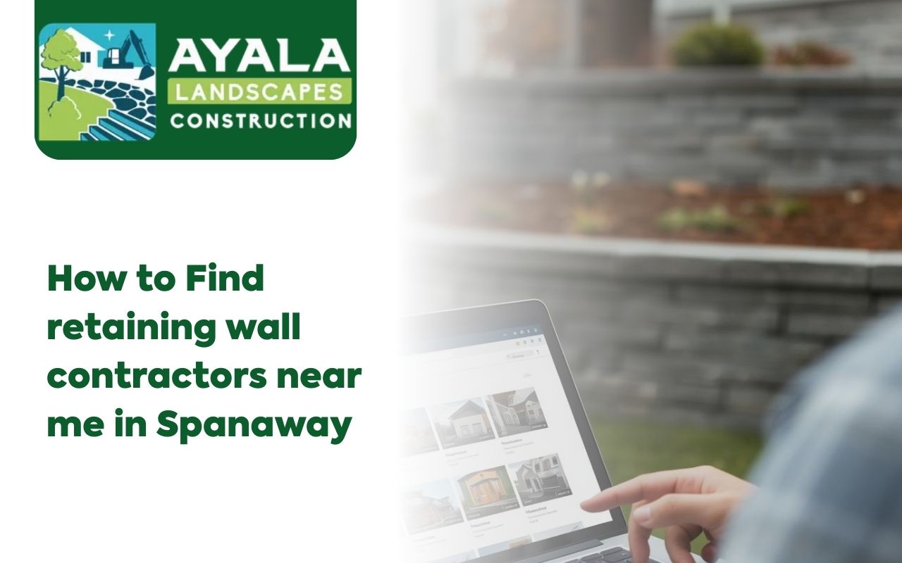 Homeowner reviewing retaining wall contractors near me in Spanaway for a new yard project